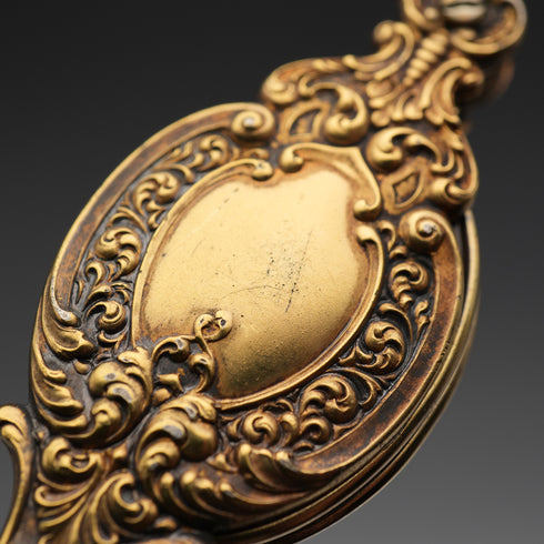 Gafas plegables portátiles de plata esterlina con baño de oro (vermeil) y decoración detallada, estilo lorgnette, antigüedad estadounidense