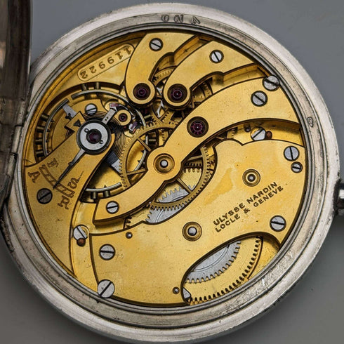 antique Ulysse Nardin pocket watch silver side hunter case works well