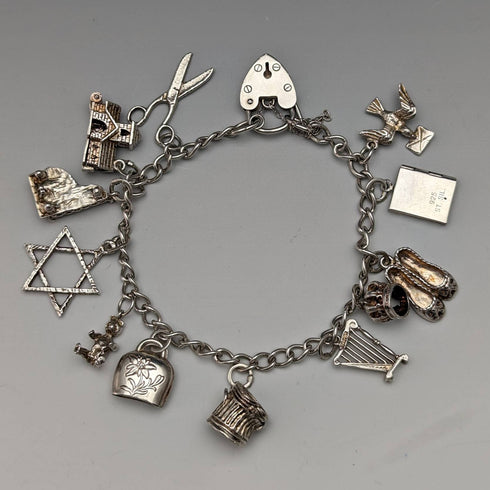British vintage sterling silver charm bracelet 31g