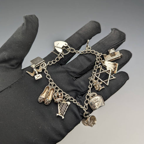 British vintage sterling silver charm bracelet 31g