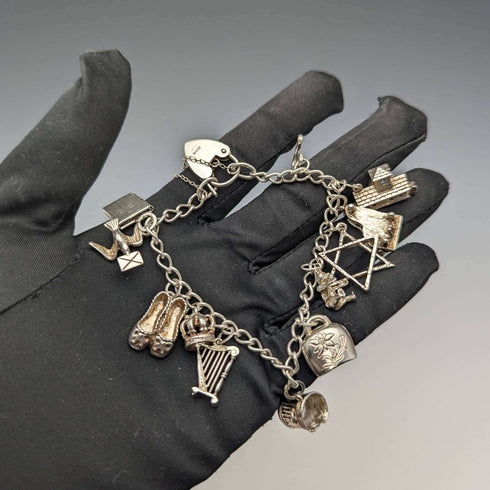 British vintage sterling silver charm bracelet 31g