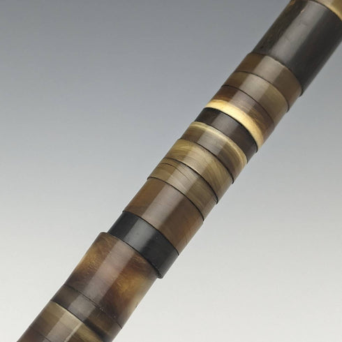 Antique British gentleman's walking stick, multi-coloured horn shaft, round handle, 85cm