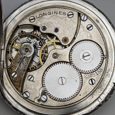 Around 1909 Antique Longines pocket watch Relief engraving Hunter case on silver side Works well