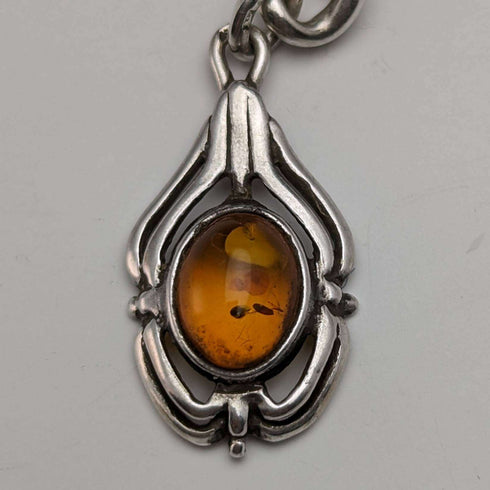 Alrededor de 1900, cadena Albert de plata esterlina antigua británica, extra gruesa de 65 g, con dije de ámbar