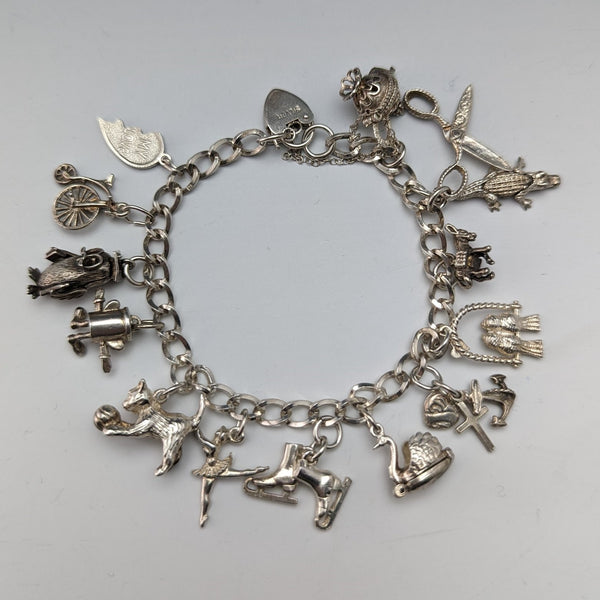 British vintage sterling silver charm bracelet 32g