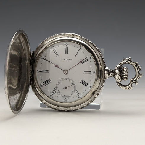 Around 1910 Antique Longines pocket watch Embossed female sculpture Silver side hunter Works well