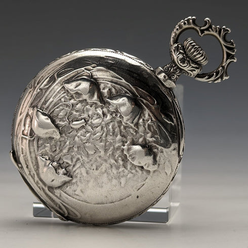 Around 1910 Antique Longines pocket watch Embossed female sculpture Silver side hunter Works well