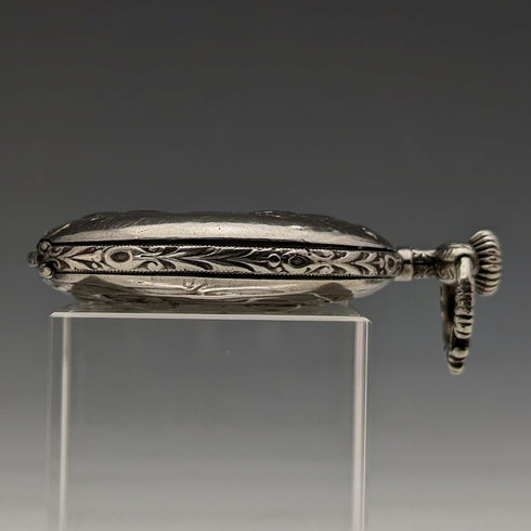 Around 1910 Antique Longines pocket watch Embossed female sculpture Silver side hunter Works well