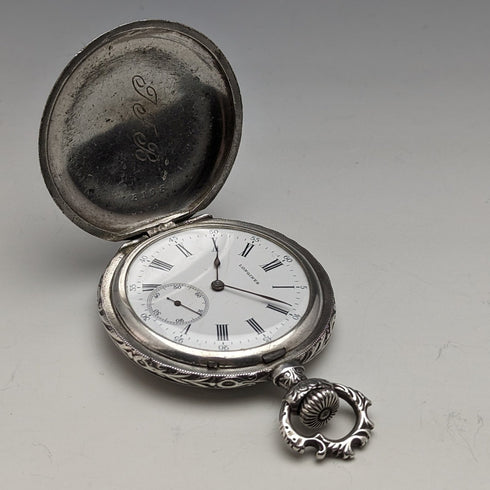 Around 1910 Antique Longines pocket watch Embossed female sculpture Silver side hunter Works well