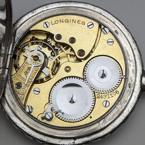 Around 1910 Antique Longines pocket watch Embossed female sculpture Silver side hunter Works well