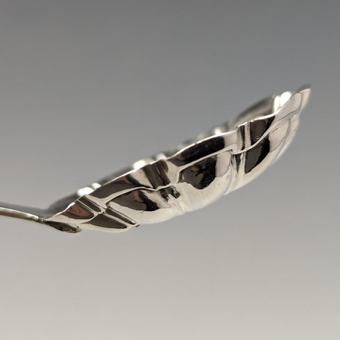 Early 19th century British antique sterling silver tea caddy spoon (with translation)