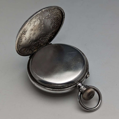 Circa 1900 Antique Swiss made small pocket watch Engraved silver side case Good working condition