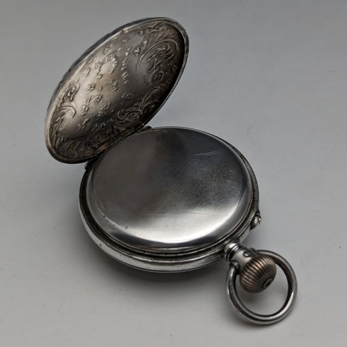 Circa 1900 Antique Swiss made small pocket watch Engraved silver side case Good working condition