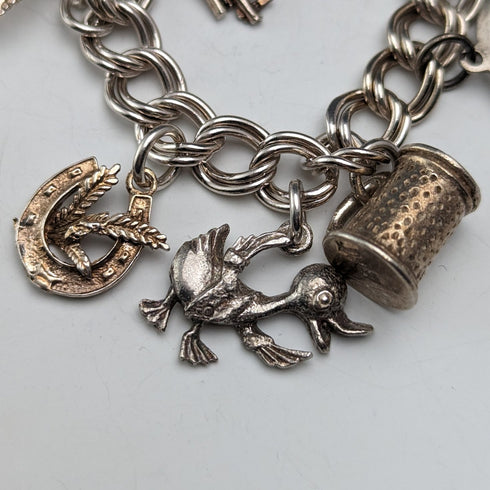 1976年 英国ヴィンテージ 純銀製 チャームブレスレット 46g