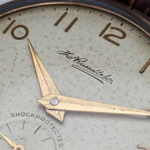 1962 British Vintage Russell Watch K9 solid gold case, in good working order, in wooden box