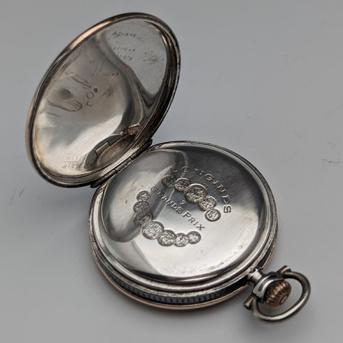 Circa 1923 Antique Longines pocket watch with flower and bird decoration, silver side Niero Hunter case, in good working order