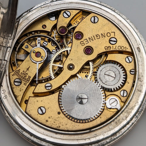 Circa 1923 Antique Longines pocket watch with flower and bird decoration, silver side Niero Hunter case, in good working order