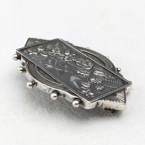 British antique silver flower and bird design brooch