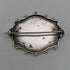 British antique silver flower and bird design brooch