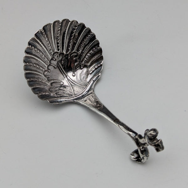 Circa 1890 Swiss antique sterling silver tea caddy spoon with shell and angel decoration