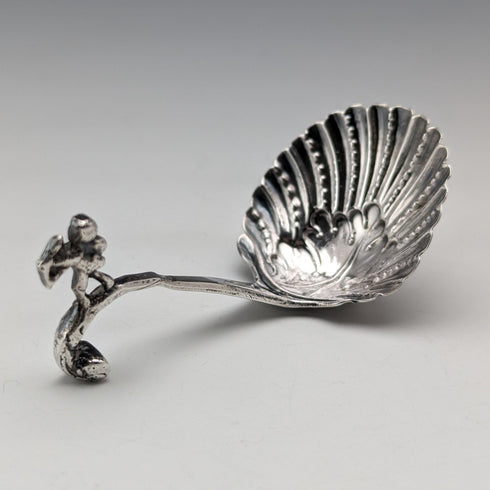 Circa 1890 Swiss antique sterling silver tea caddy spoon with shell and angel decoration