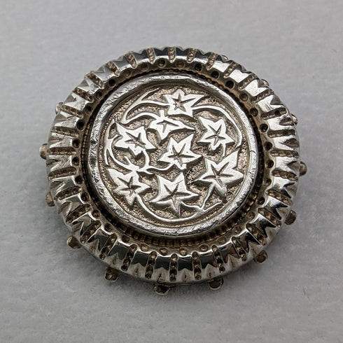 Vintage silver leaf engraved round brooch
