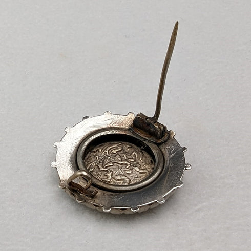Vintage silver leaf engraved round brooch
