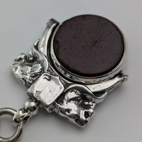 Circa 1900 British antique sterling silver Albert chain, 56g, large two-tone rotating fob