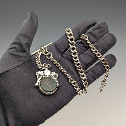 Circa 1900 British antique sterling silver Albert chain, 56g, large two-tone rotating fob