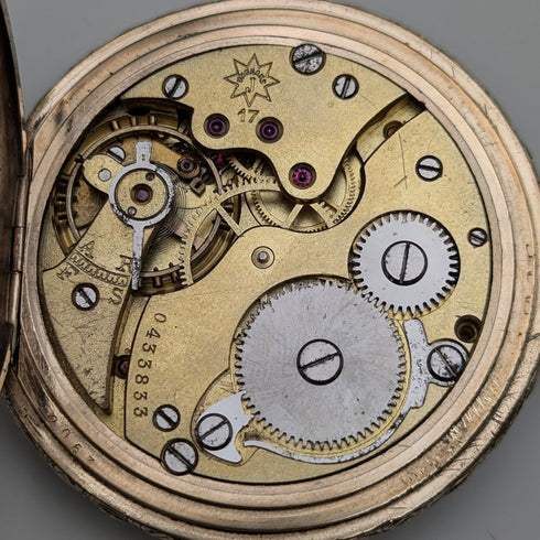 Circa 1930 German Junghans pocket watch with gold-plated hunter case, refurbished
