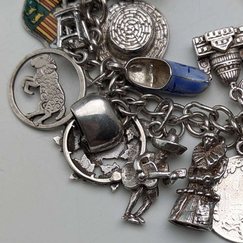 1970s British vintage sterling silver charm bracelet, 68g