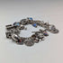 1970s British vintage sterling silver charm bracelet, 68g