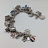 1970s British vintage sterling silver charm bracelet, 68g