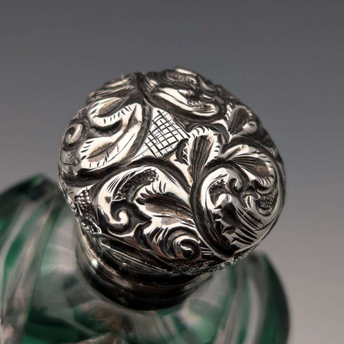 Antique British silver-lidded green cut glass portable perfume bottle