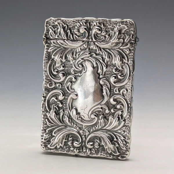 Antique American sterling silver card case with embossed decoration, 75g