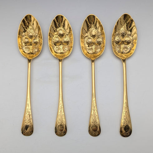 Set of 4 late 19th century British antique gold plated berry spoons