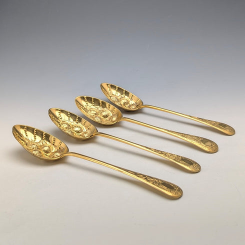 Set of 4 late 19th century British antique gold plated berry spoons