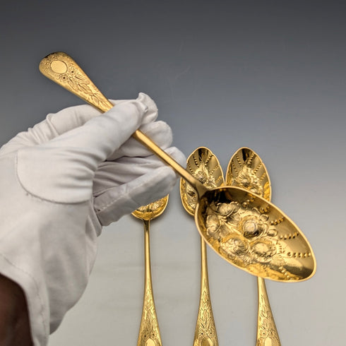 Set of 4 late 19th century British antique gold plated berry spoons