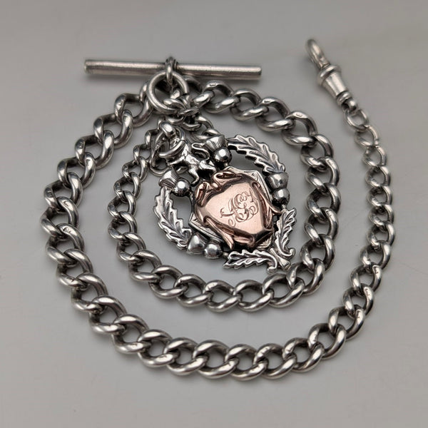 Circa 1910 British antique sterling silver Albert chain, 52g, sterling silver emblem fob