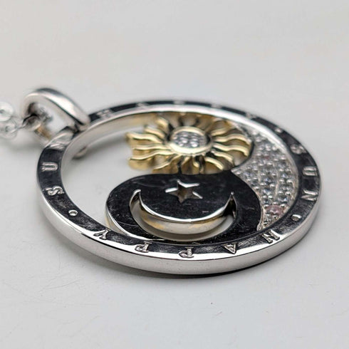 Vintage sterling silver pendant with moon and sun design, 13.5g, with necklace