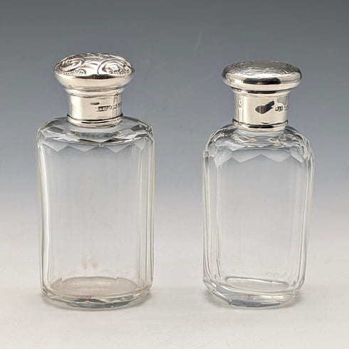 Circa 1900 British antique sterling silver screw-top glass bottle pair