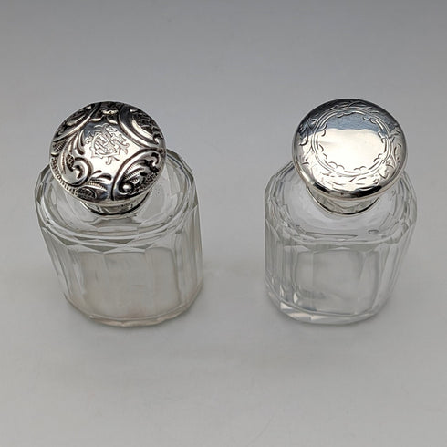 Circa 1900 British antique sterling silver screw-top glass bottle pair