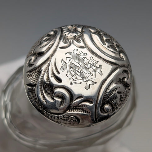 Circa 1900 British antique sterling silver screw-top glass bottle pair