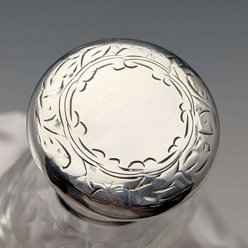 Circa 1900 British antique sterling silver screw-top glass bottle pair