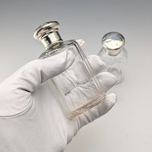 Circa 1900 British antique sterling silver screw-top glass bottle pair