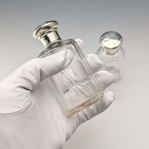 Circa 1900 British antique sterling silver screw-top glass bottle pair