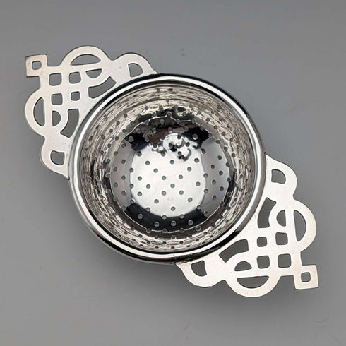 Vintage British silver plate tea strainer