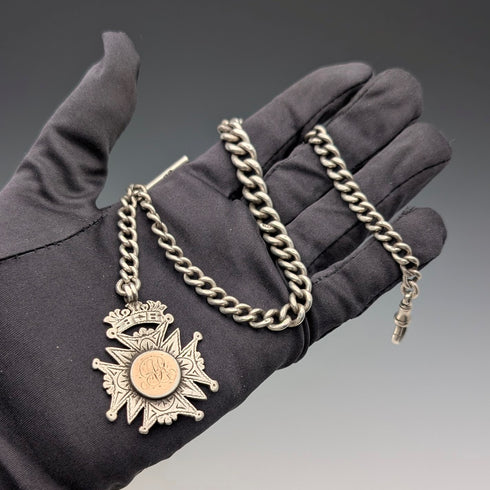 Circa 1900 British antique sterling silver Albert chain, 56g sterling silver medal fob