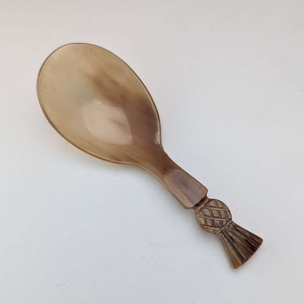 Antique British horn tea caddy spoon with thistle decoration