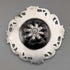 Antique American sterling silver tea strainer with floral decoration